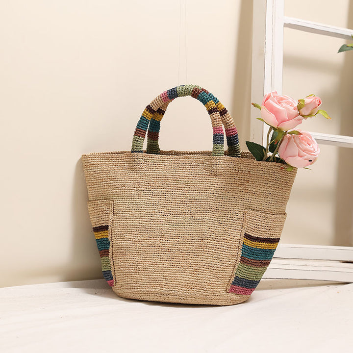 Handcrafted basket bag with colorful stripe accents Stornfield