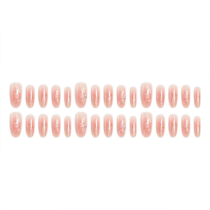 Acrylic nail set with filigree flower and glitter elements Stornfield