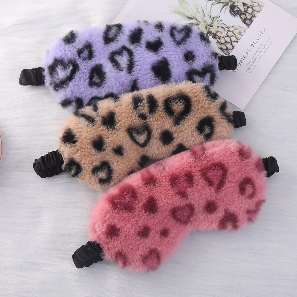 Women's cuddly faux fur sleep mask with heart-embossed surface and gathered comfort band Stornfield