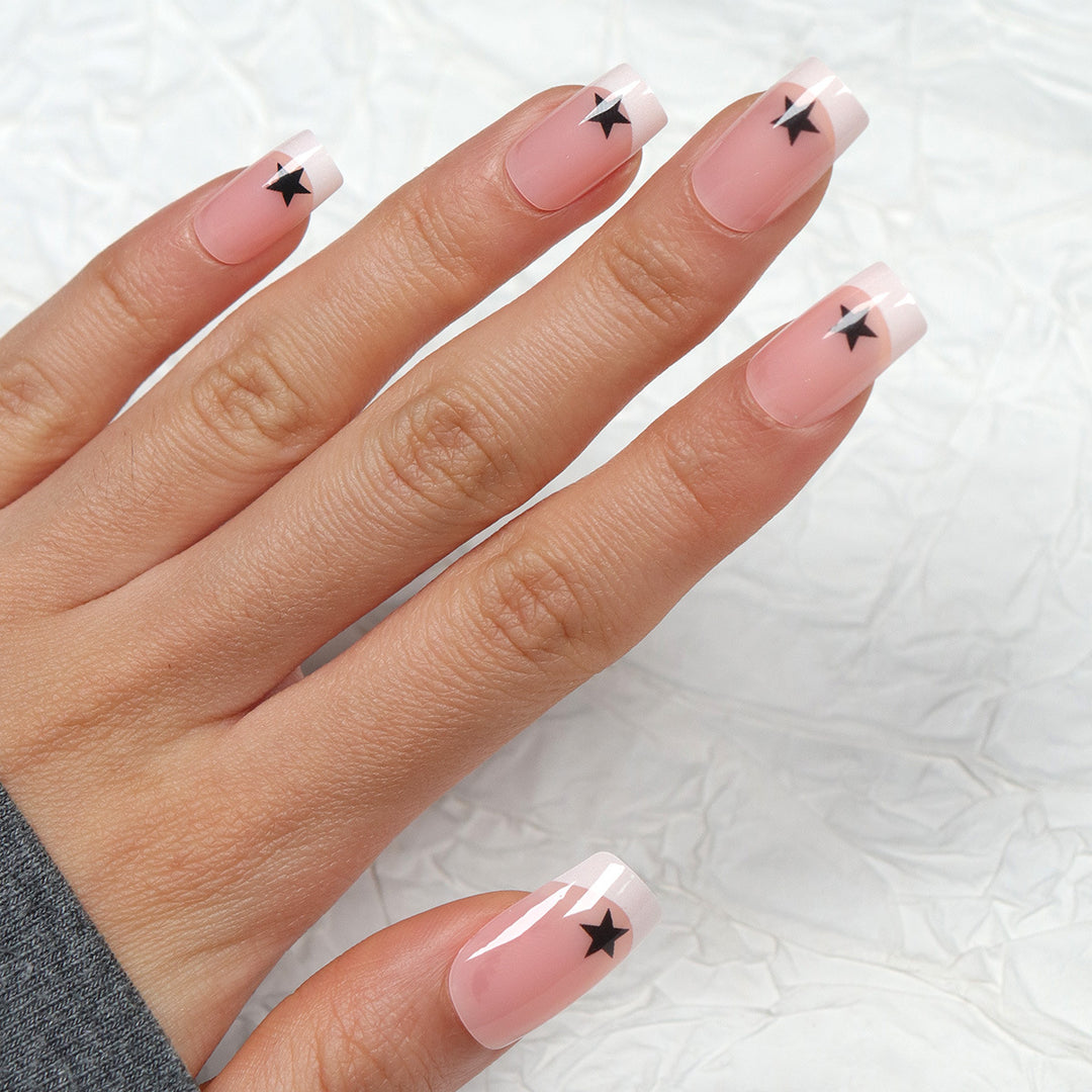 Artistic French Tip Press-On Nails with Star Accents Stornfield