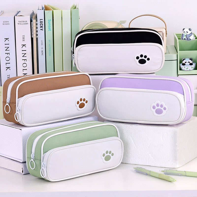Pencil case with double compartment design and playful paw print motif Stornfield