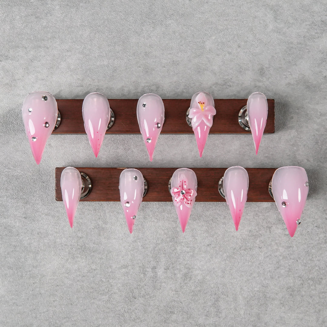 Artistic Stiletto Press-On Nails with Floral and Gem Accents