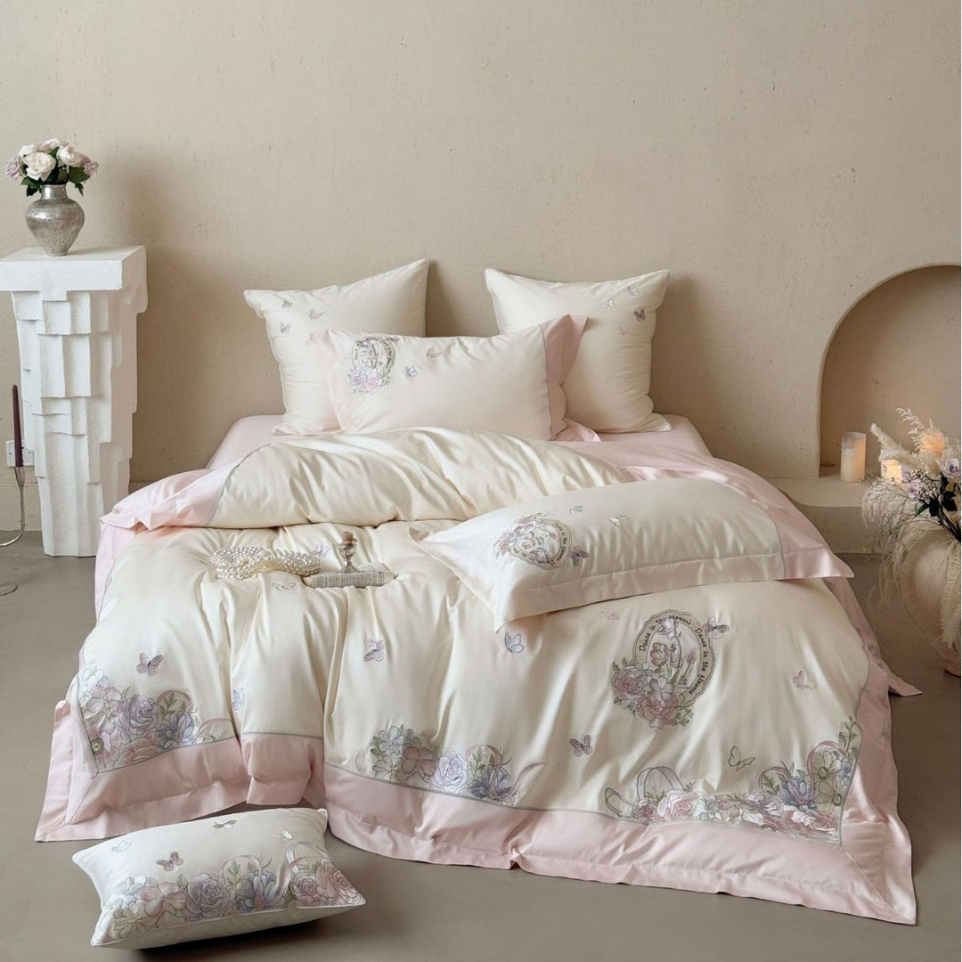 Luxurious floral embroidered cotton satin bedding set with ruffle and decorative pillow Stornfield