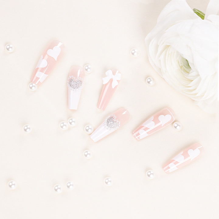 Artificial nail extensions with elegant floral design Stornfield