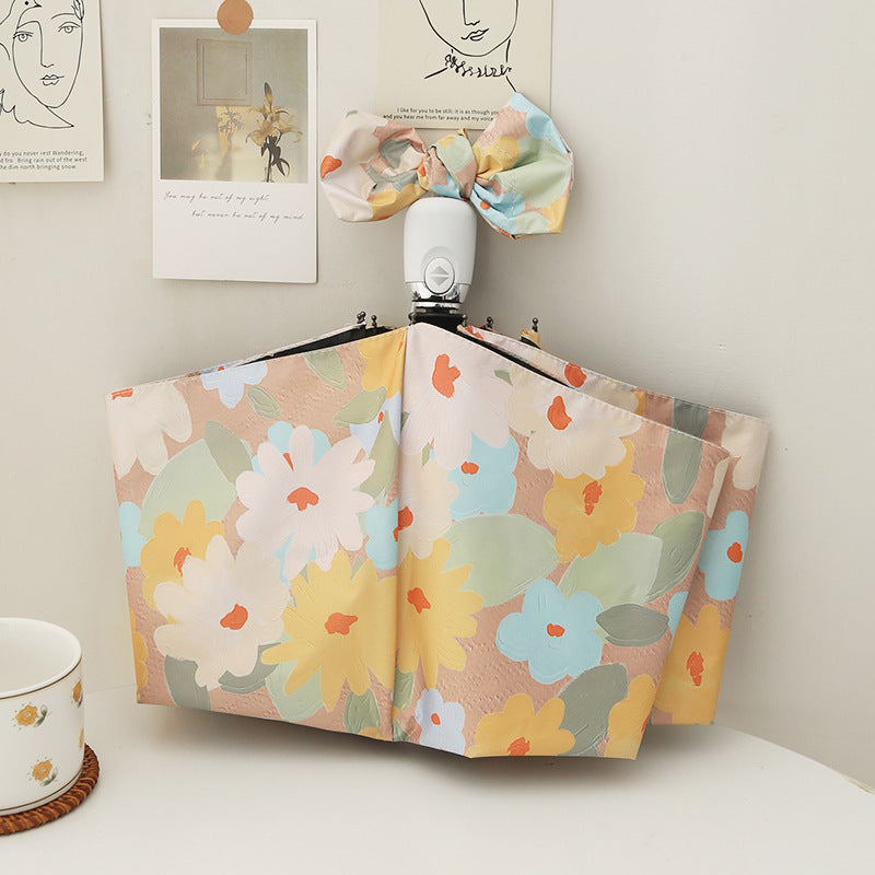 Ladies folding umbrella with creative floral pattern and automatic opening mechanism Stornfield