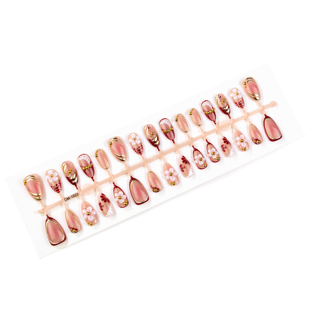 Artistic Press-On Nail Art Set with Floral and Gold Details Stornfield