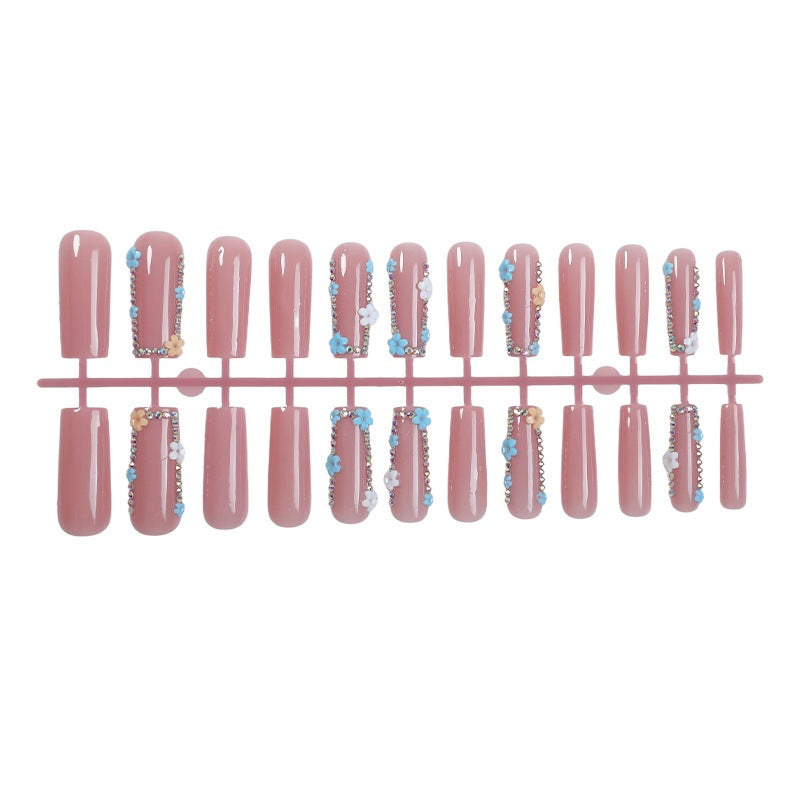 Artificial nail set with shimmering flower and glitter decorations Stornfield