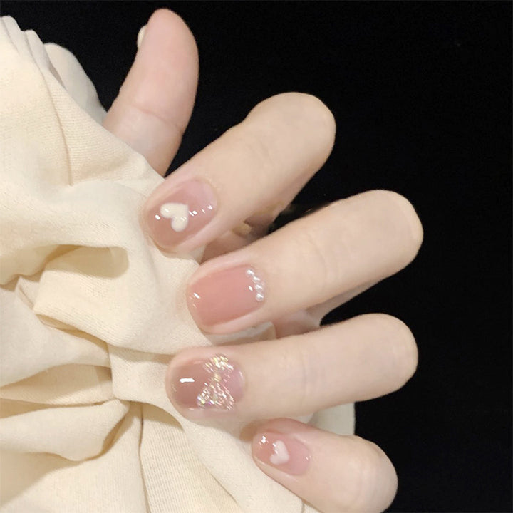 Artful nail extensions with an elegant leaf pattern Stornfield