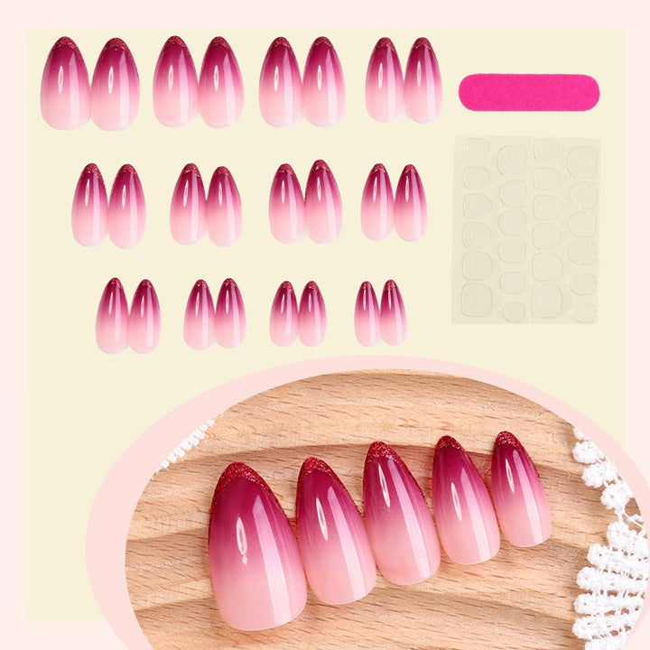 Artificial nail set with ombre design and glitter tips Stornfield