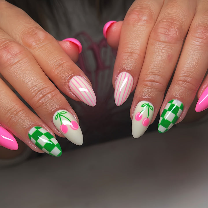 Artificial nails with fruity cherry design and striking colors Stornfield