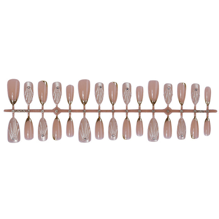 Artificial nail set with elegant shell design and glitter accents Stornfield