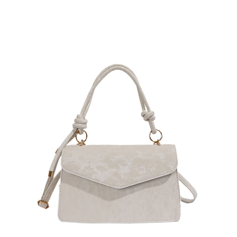 Elegant Floral Embossed Handbag