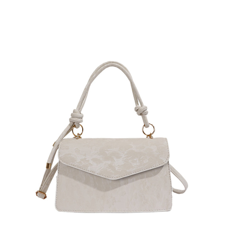Elegant Floral Embossed Handbag