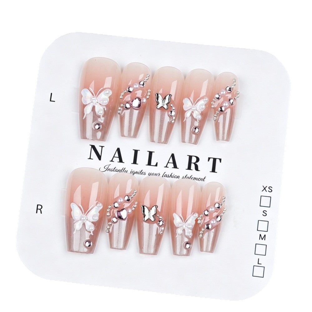 Artificial nails with glamorous decorations and shine Stornfield