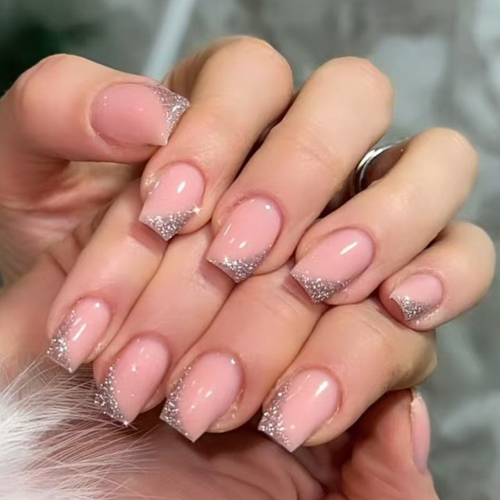 Acrylic nail set with shimmering glitter tips Stornfield