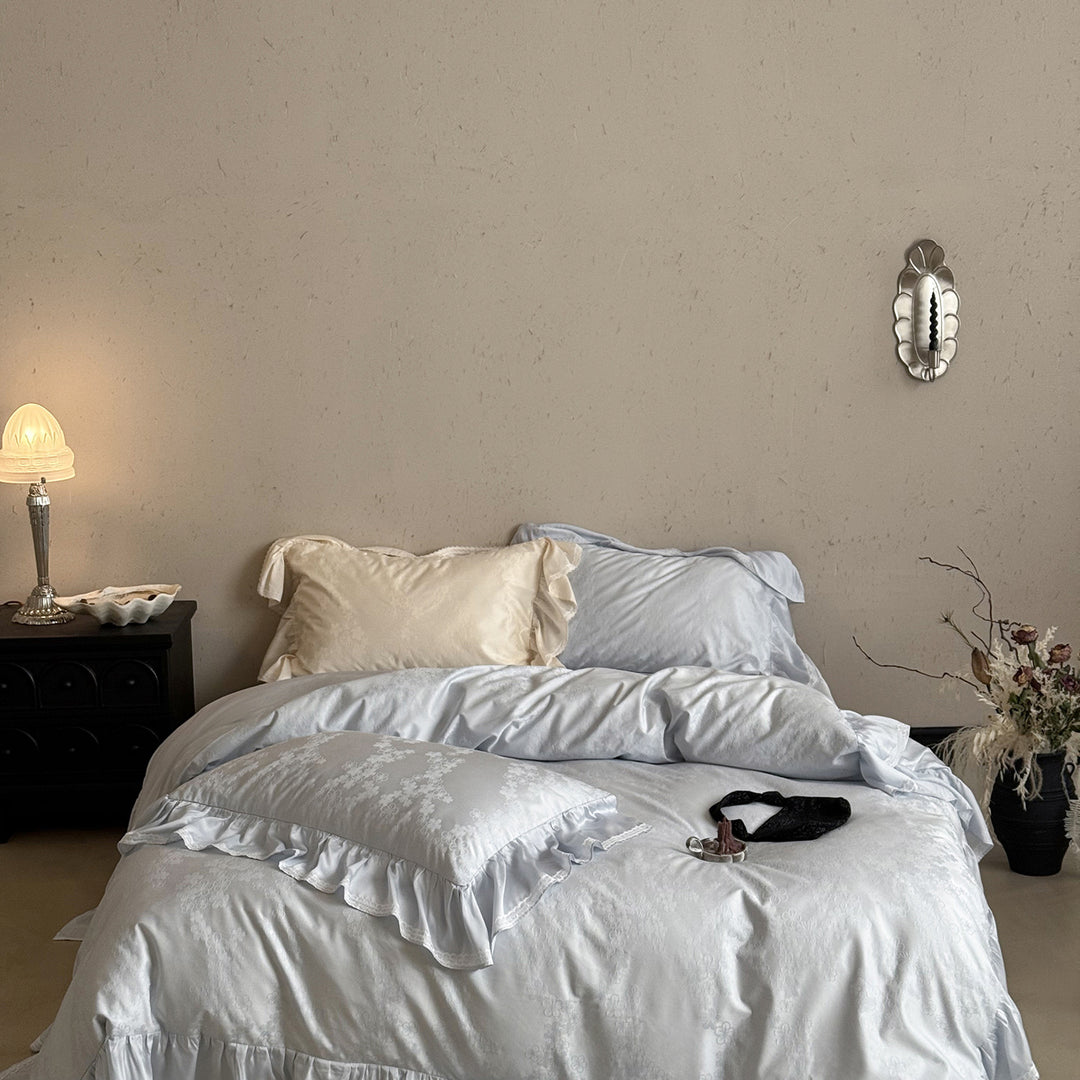 Luxurious cotton satin bedding set with ruffled hem