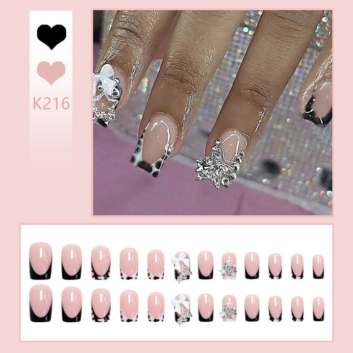Acrylic nail set with glamorous starlights and elegant embellishments Stornfield