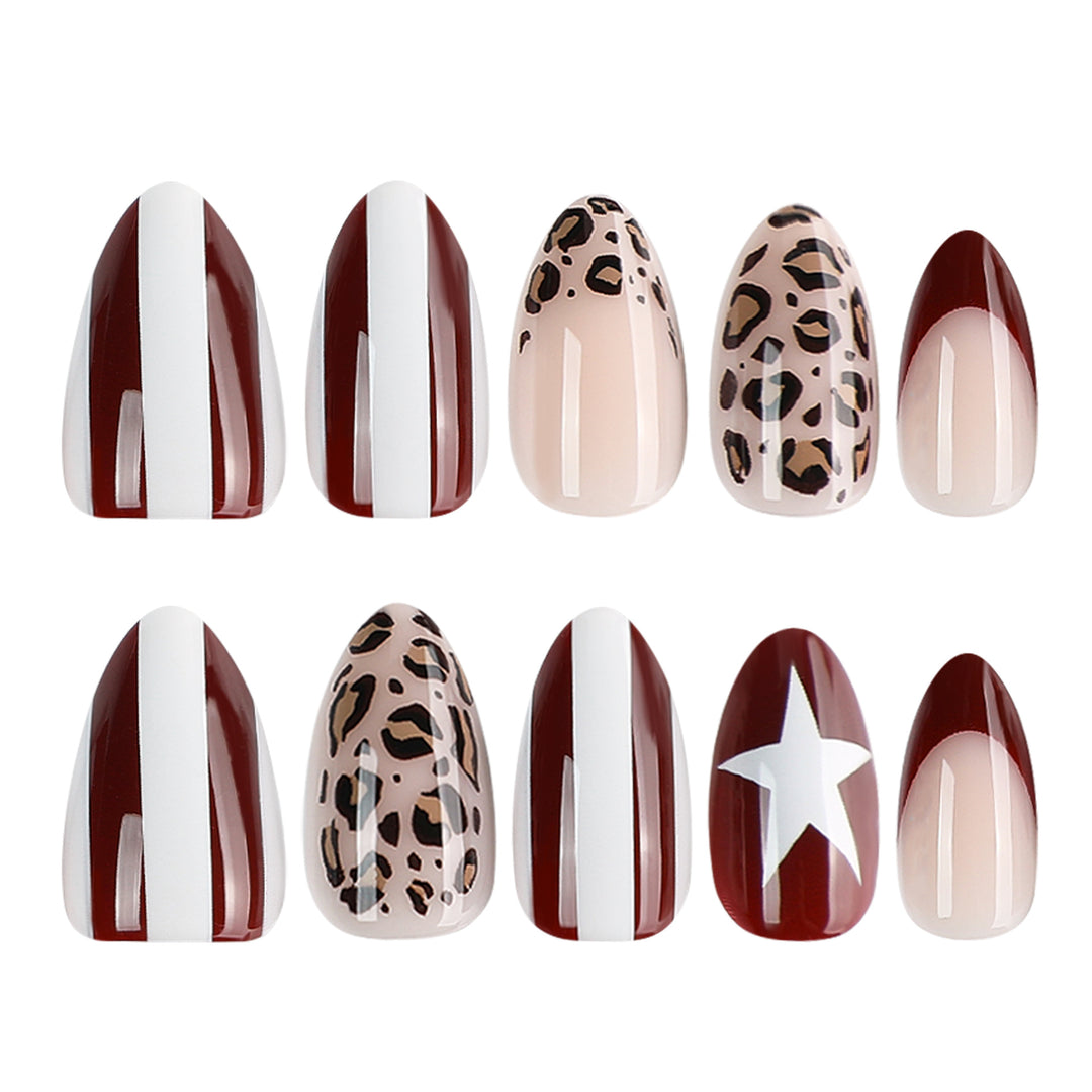 Artful stiletto nails with leopard pattern and elegant glitter decoration Stornfield