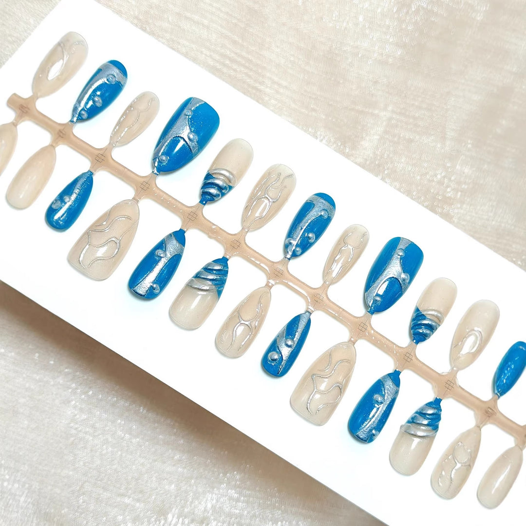 Artificial nails with creative shimmer design Stornfield