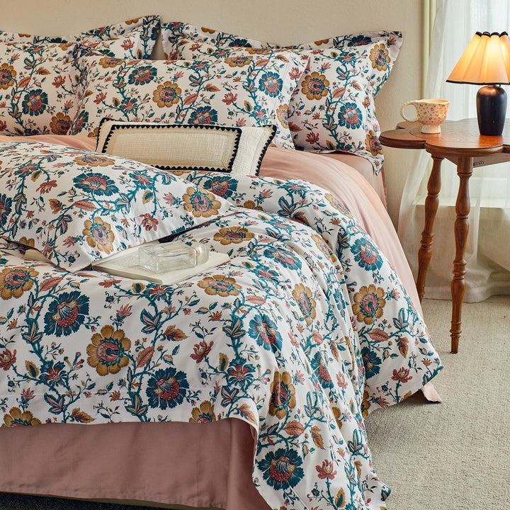Luxurious cotton satin bed linen set with millefleurs floral pattern and fine piping