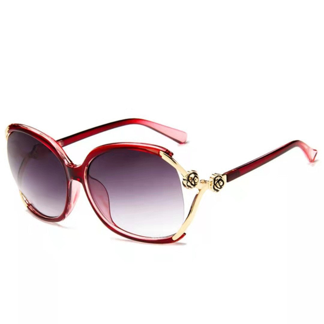 Ladies elegant oversized sunglasses with golden accents Stornfield
