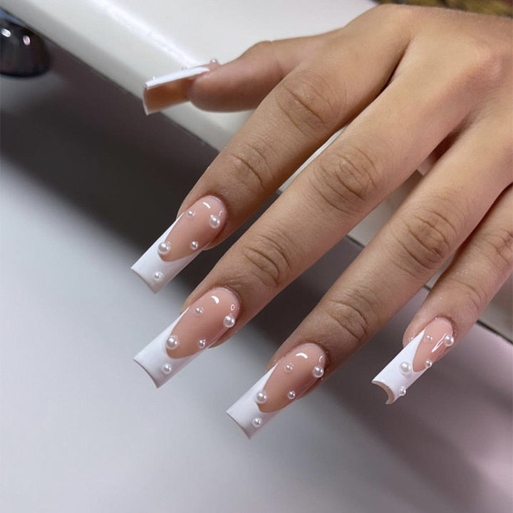 Nail art set with exquisite pearl accents and transparent design Stornfield