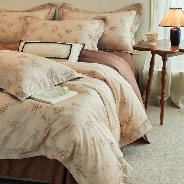 Luxurious cotton satin bed linen set with millefleurs floral pattern and fine piping