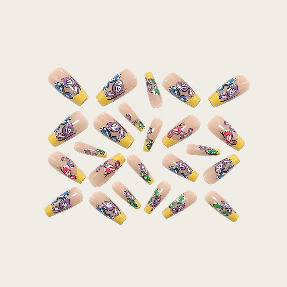 Nail set with intricate butterfly design Stornfield