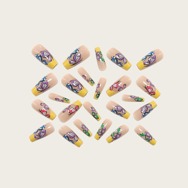 Nail set with intricate butterfly design Stornfield
