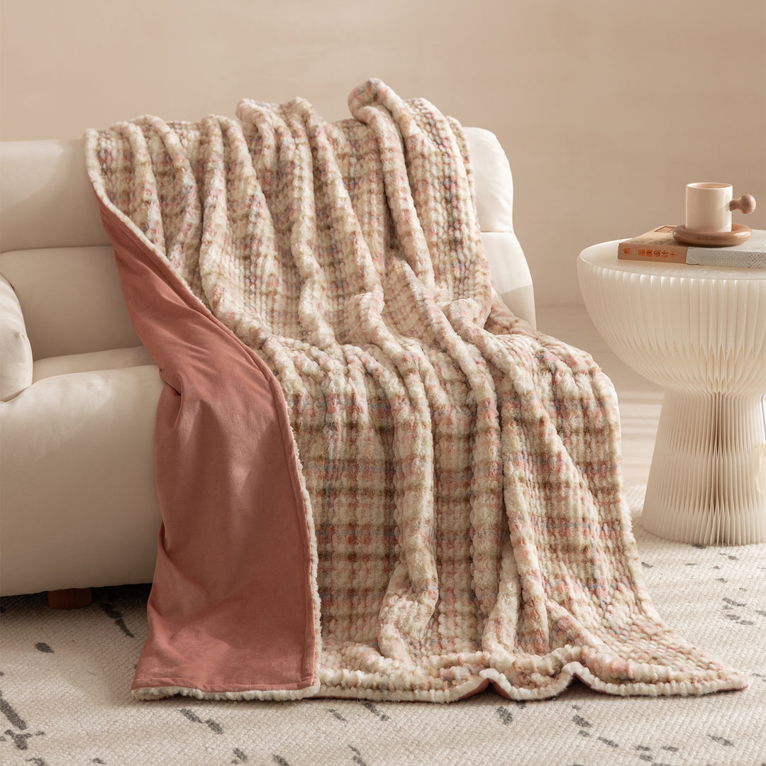 Cozy blanket made of luxurious synthetic fur with wavy texture and soft microfiber back Stornfield
