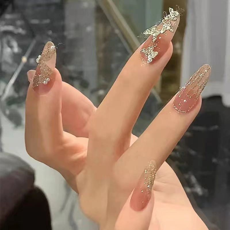 Glamorous artificial nails with sparkling accents Stornfield