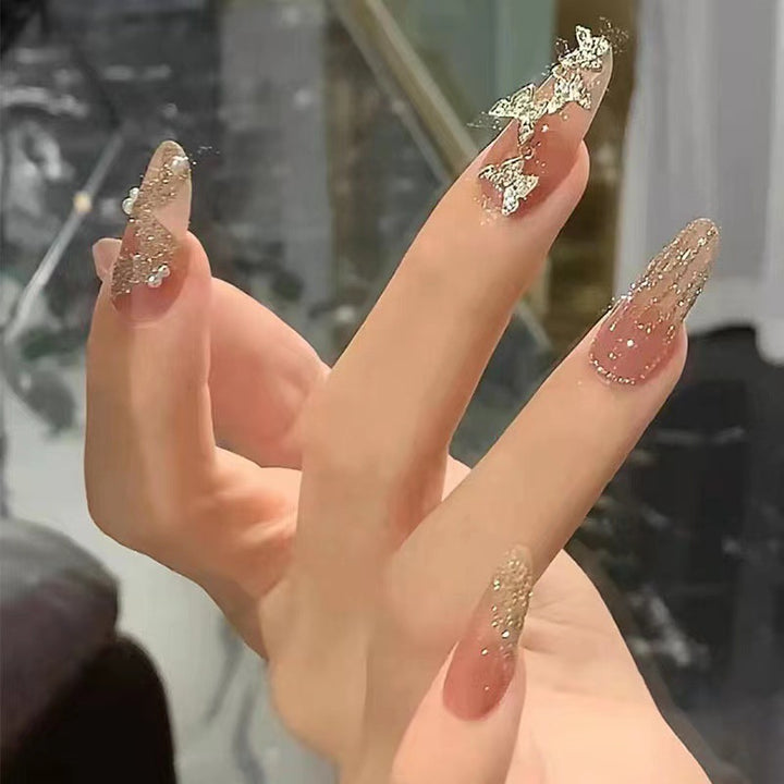 Glamorous artificial nails with sparkling accents Stornfield