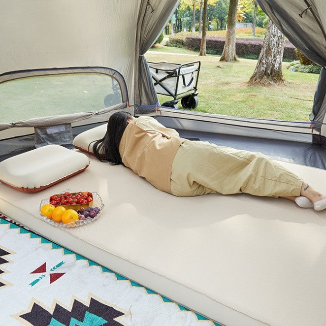 thick inflatable camping mattress with integrated pillow and puncture-resistant TPU shell Stornfield