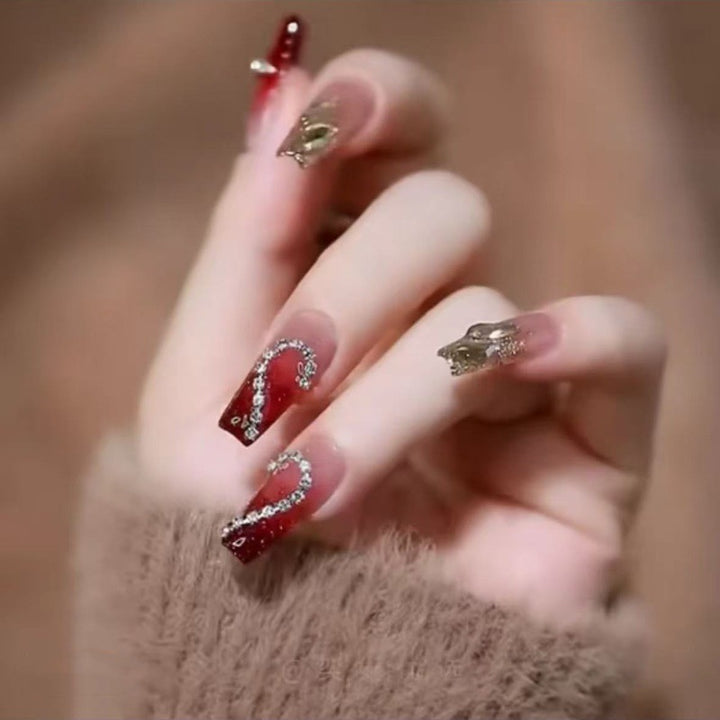 Artificial artificial fingernails with elegant heart accents Stornfield