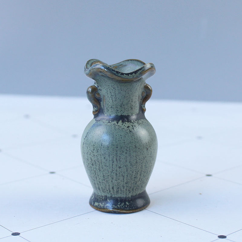 Elegant ceramic vase with artistic design Stornfield