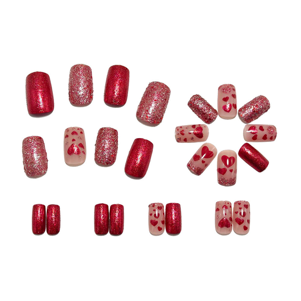 Artificial nails with heart design and glitter Stornfield