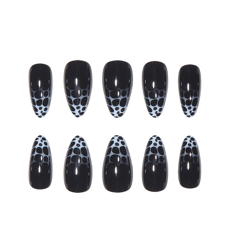 Stiletto Nail Art with Abstract Patterns Stornfield