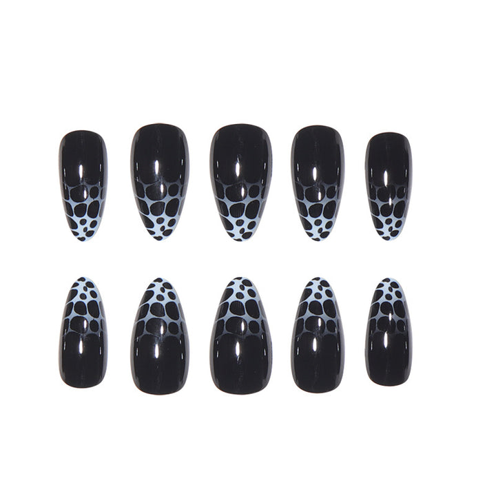 Stiletto Nail Art with Abstract Patterns Stornfield