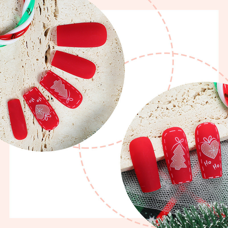 Christmas nail art set with festive motifs and glitter accents Stornfield