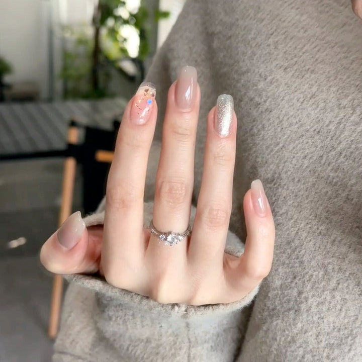 Artistic Nail Extensions with Decorative Elements Stornfield