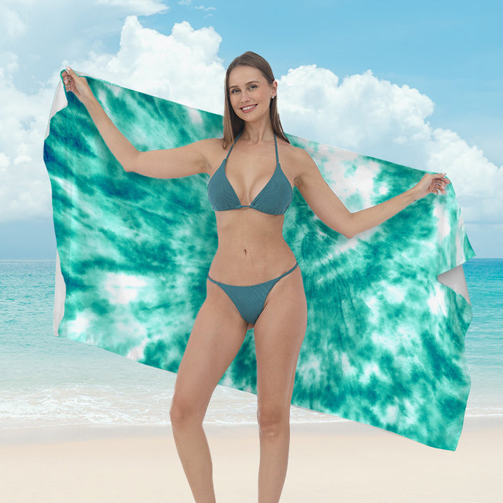 Beach towel with vibrant tropical plant motif Stornfield