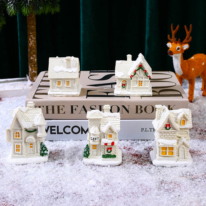 Illuminated Christmas village house with festive decoration Stornfield