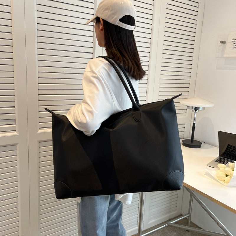Large travel bag with durable material and multiple compartments Stornfield