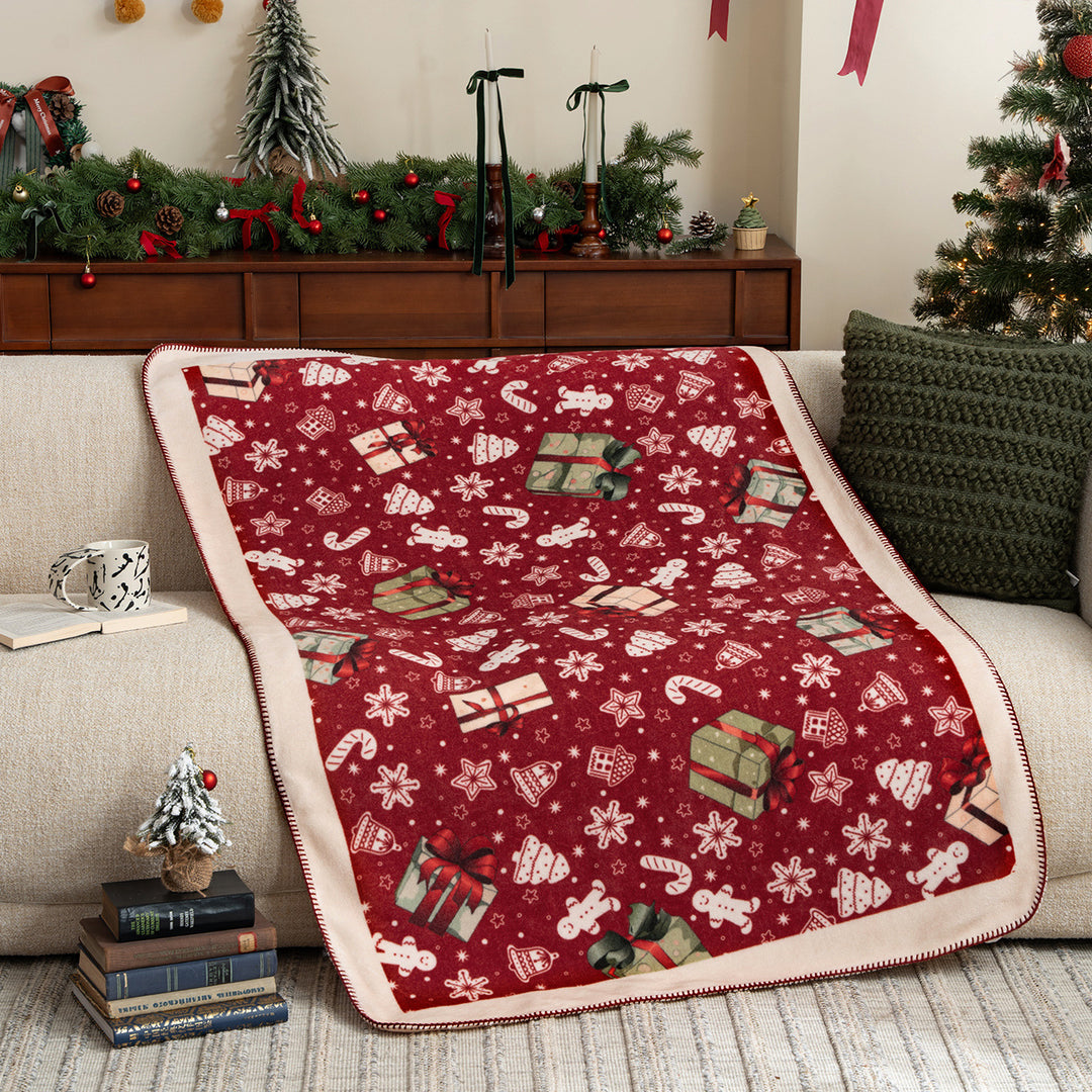 Soft Christmas fleece blanket with gift and gingerbread motif Stornfield