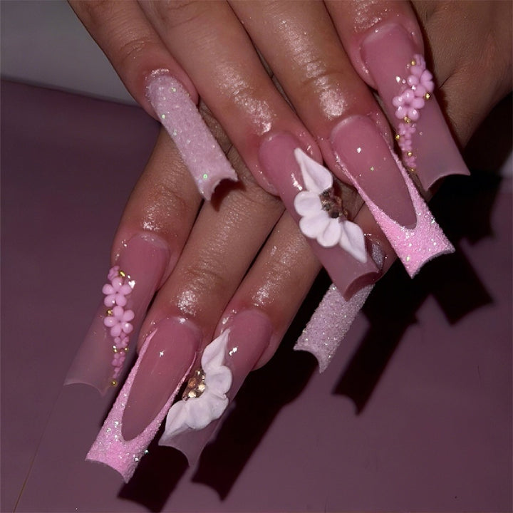 Artificial nail set with romantic floral and glitter elements Stornfield