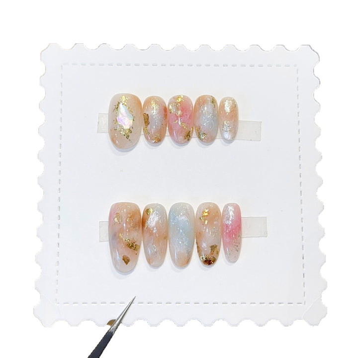 Artificial nails with glamorous metallic details and sparkling design Stornfield