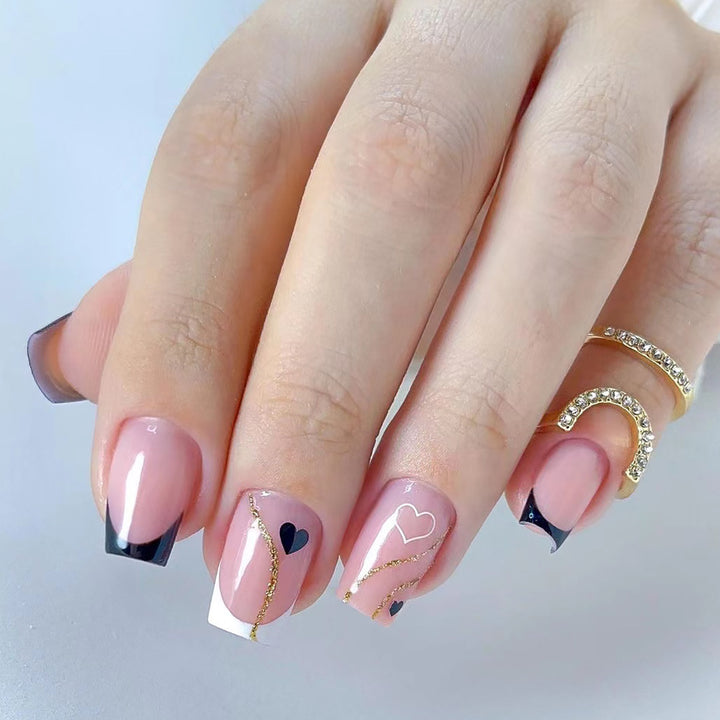 Artful nail extensions with an elegant leaf pattern Stornfield