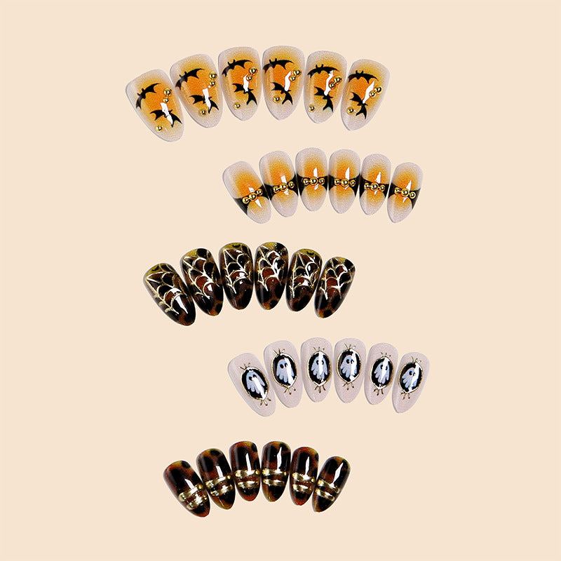Artificial nails with Halloween motifs and glitter details Stornfield