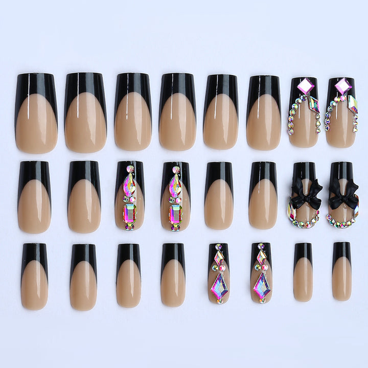 Glamorous artificial nail set with sparkling rhinestone and bow decorations Stornfield