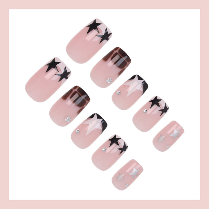 Acrylic nail set with glamorous star and glitter accents Stornfield